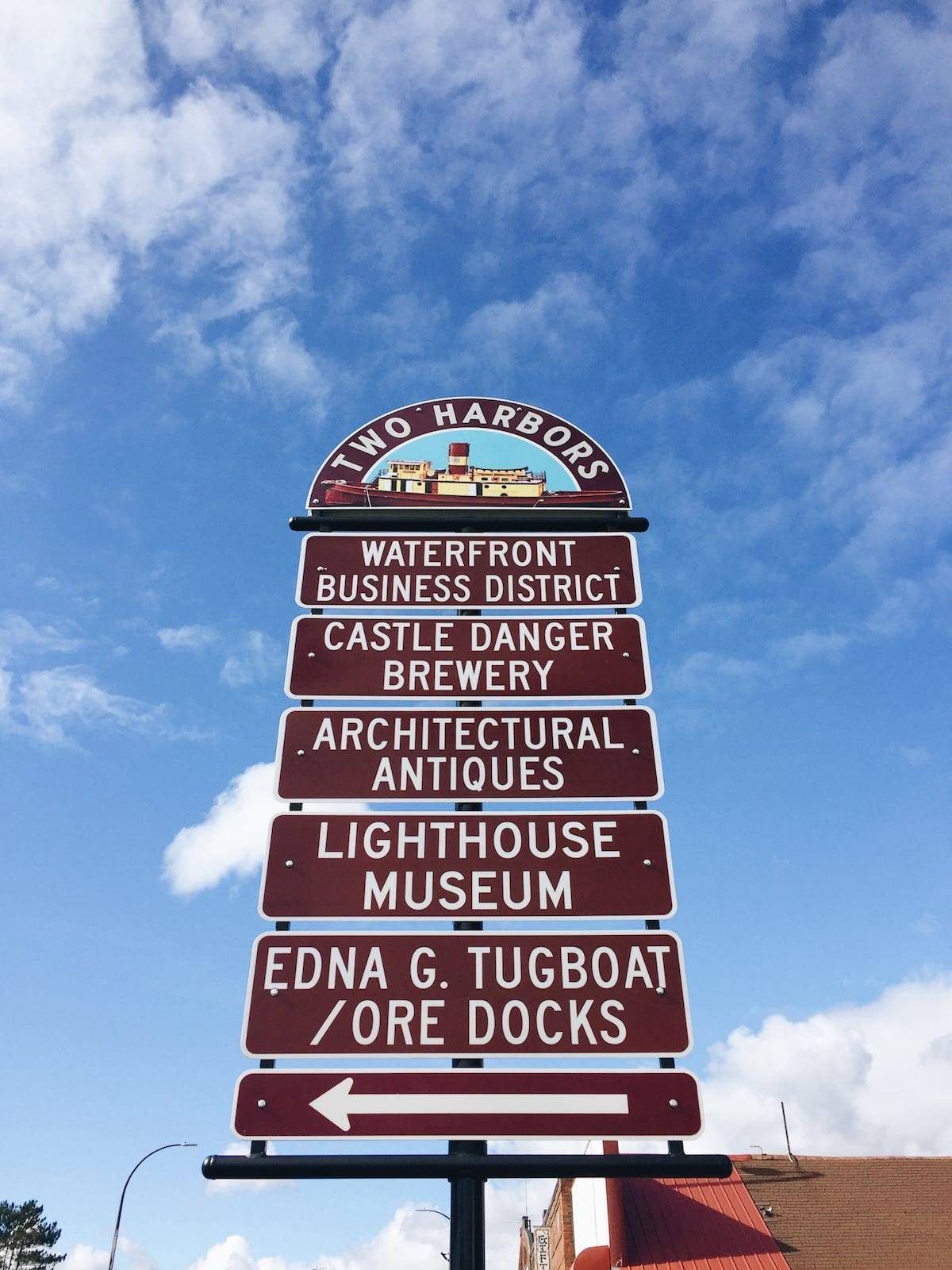 Multiple signs pointing in different directions.