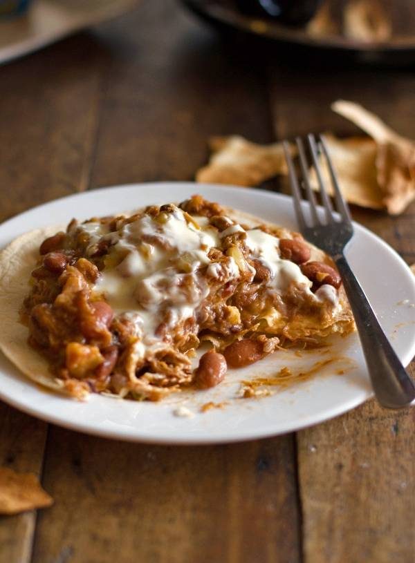 Crockpot chalupa on a plate with a fork.