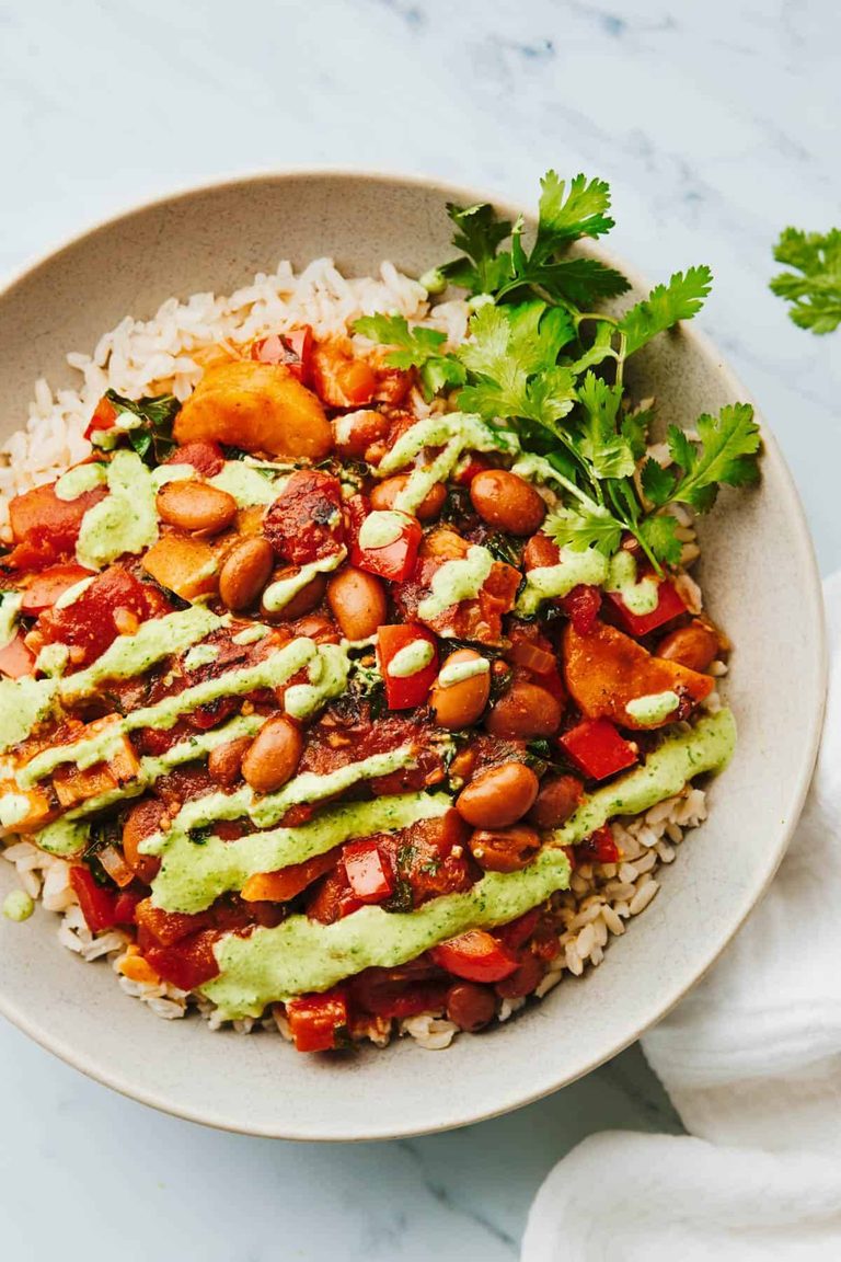 Plantain and pinto stew with aji verde on top.