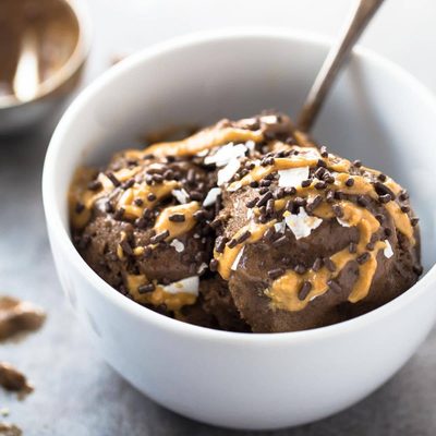 Naturally Sweet Banana Ice Cream in a bowl with a spoon.
